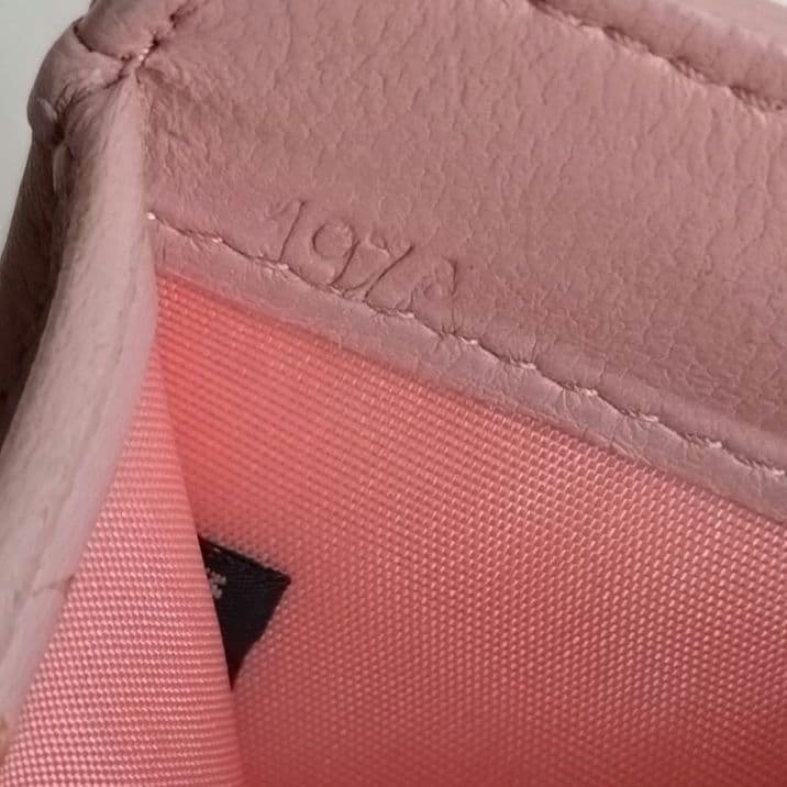 MIUMIU マテラッセ コンパクトウォレットゴールドロゴ ピンク