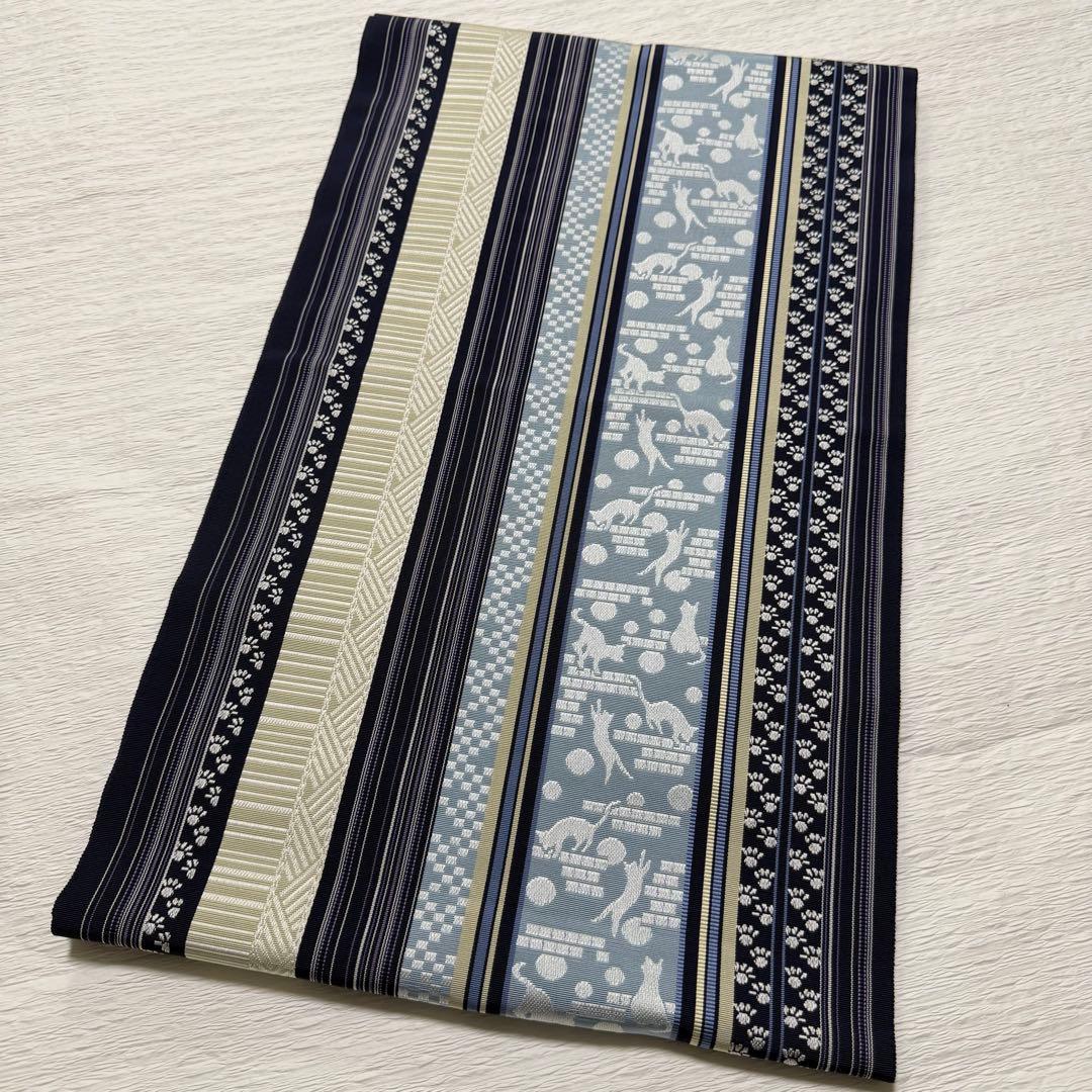 m-45 本場筑前博多織 黒木織物 猫 足跡 名古屋帯 正絹 未使用極美品