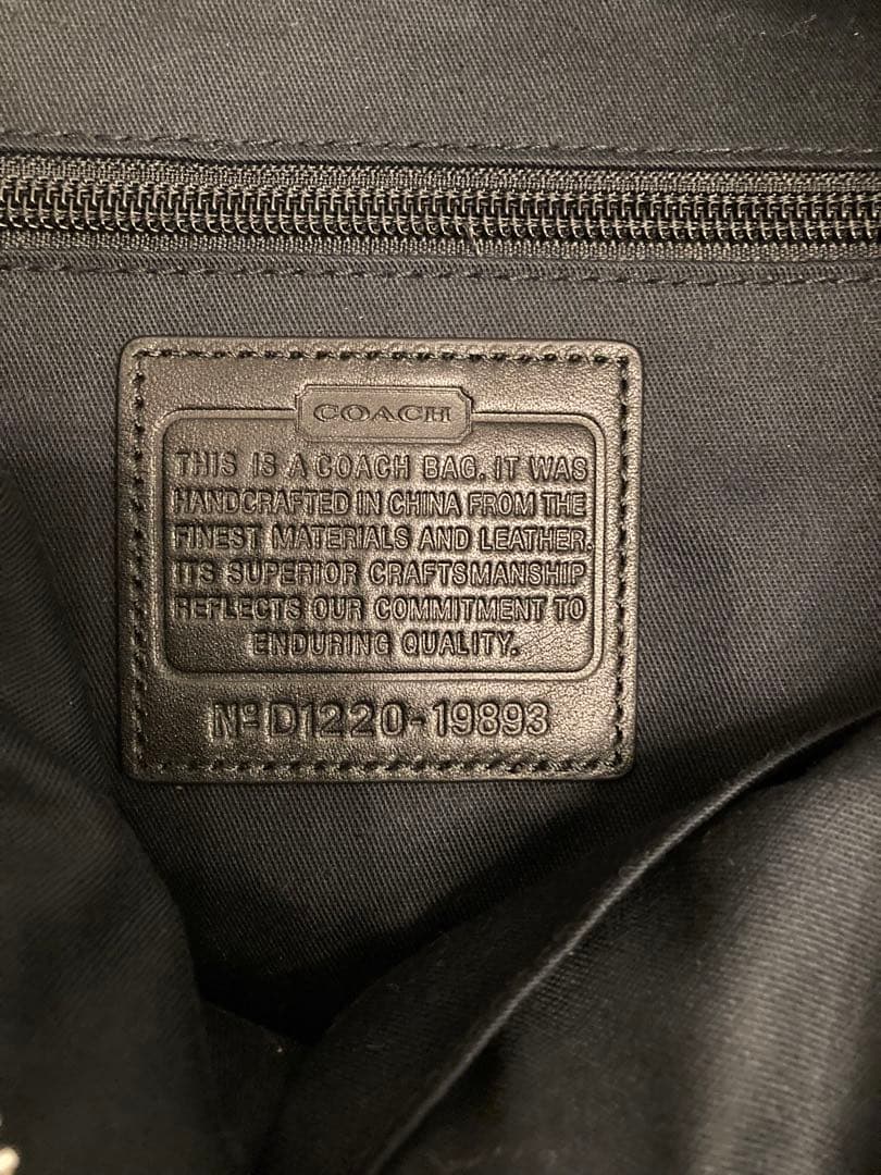 COACH ブラック ショルダーバッグ タッセル付き