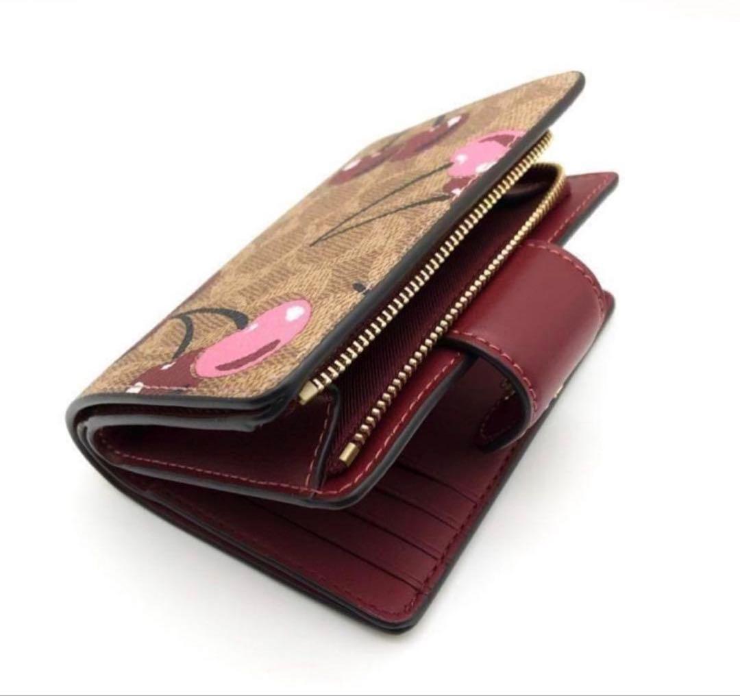 coachコーチシグネチャーチェリープリントミディアム二つ折り財布