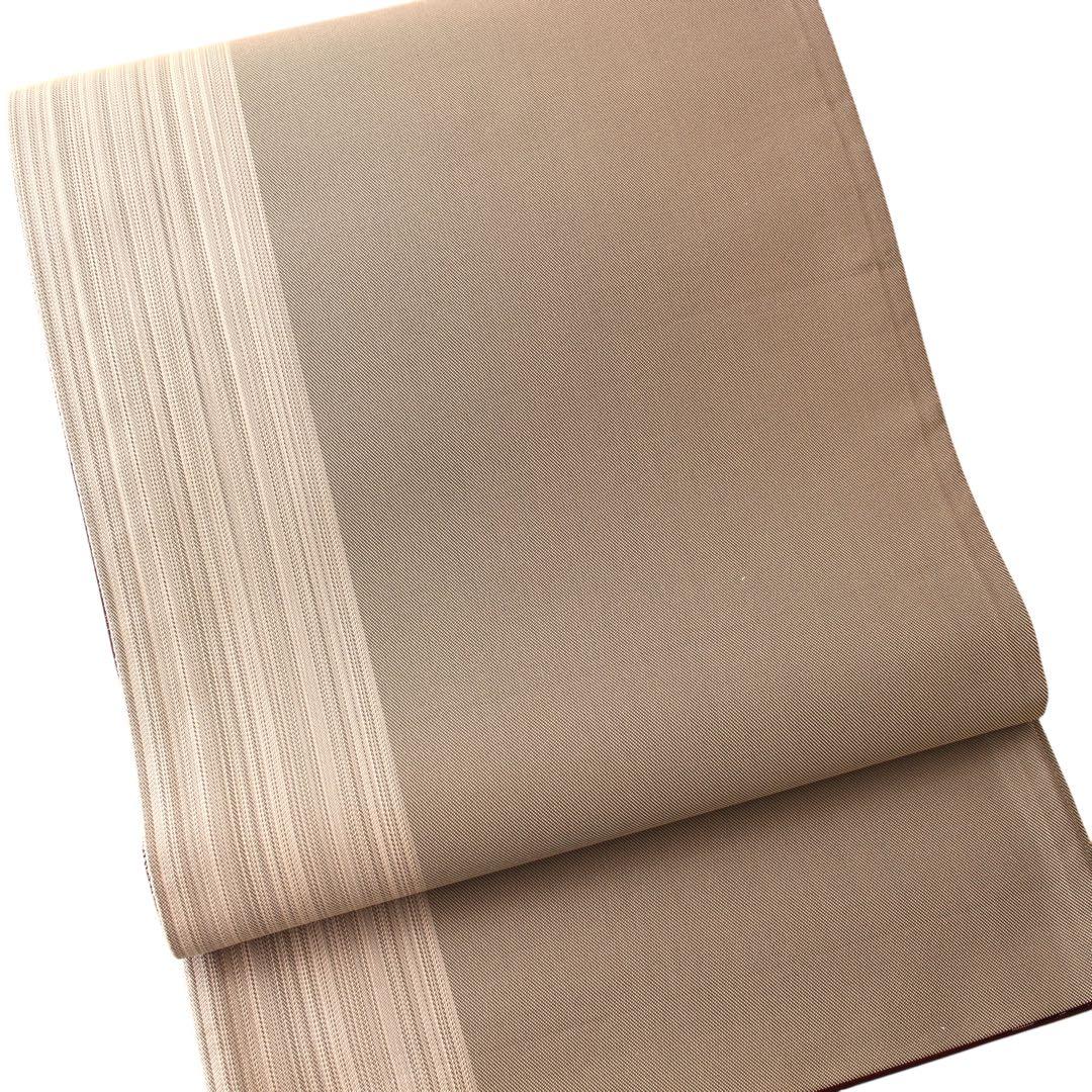 未使用　美品　横段模様織出し全通袋帯　リバーシブル　長尺　ブラウン系　d60