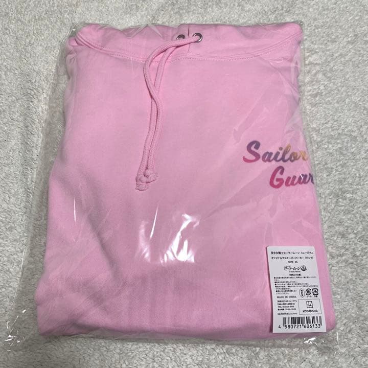 プルオーバーパーカー　ピンク　XL  セーラームーン　ミュージアム　原画　原作