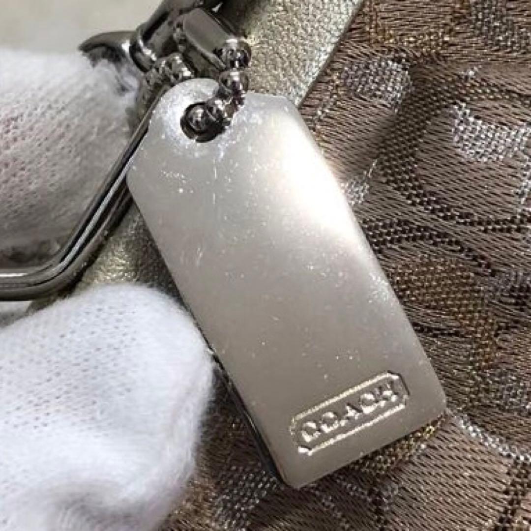 コーチ レザー ミニ ハンドバッグ シグネチャー キャンバス ガマ口