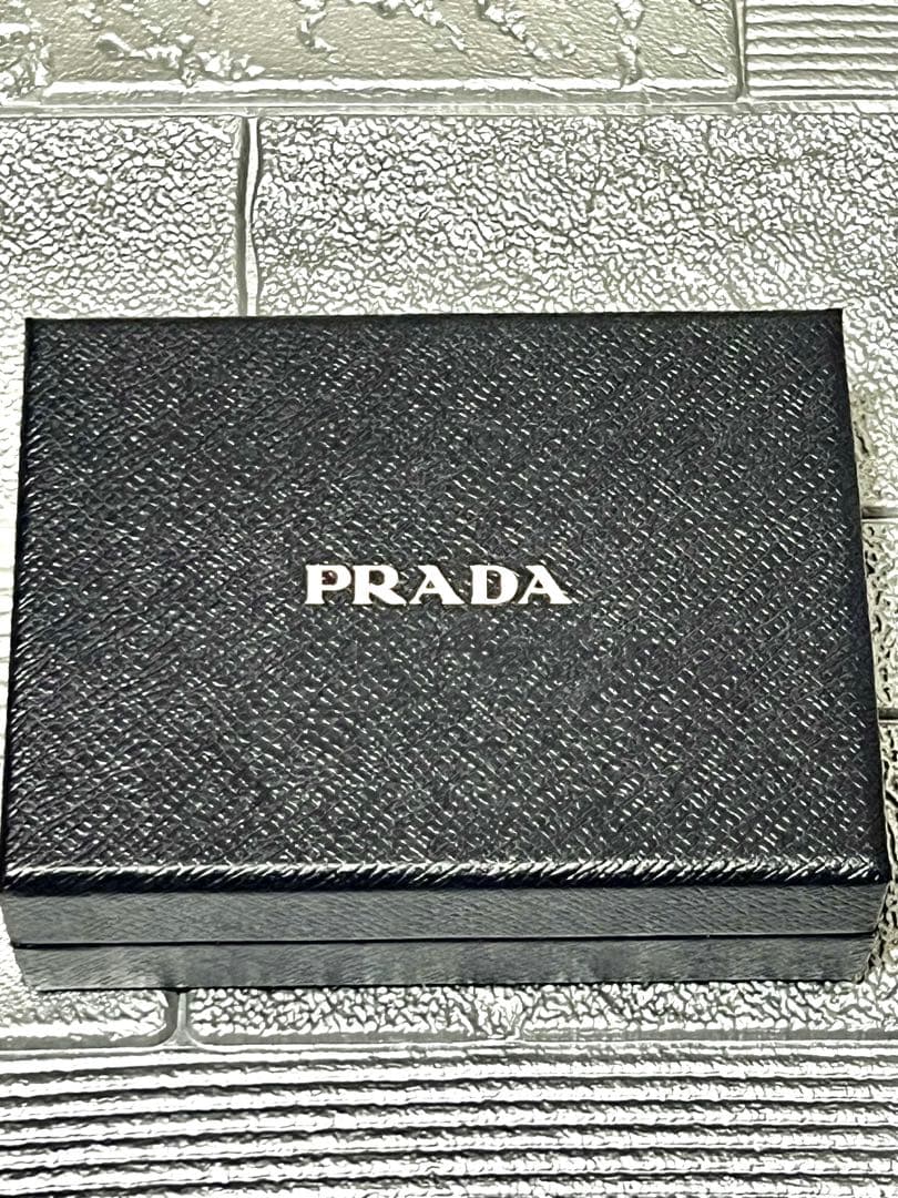 PRADA 1MH043 サフィアーノトライアングル 三つ折り財布