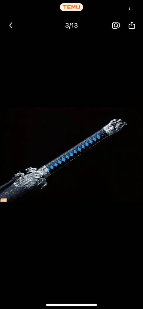 美しい刀 青い模様の黒い柄