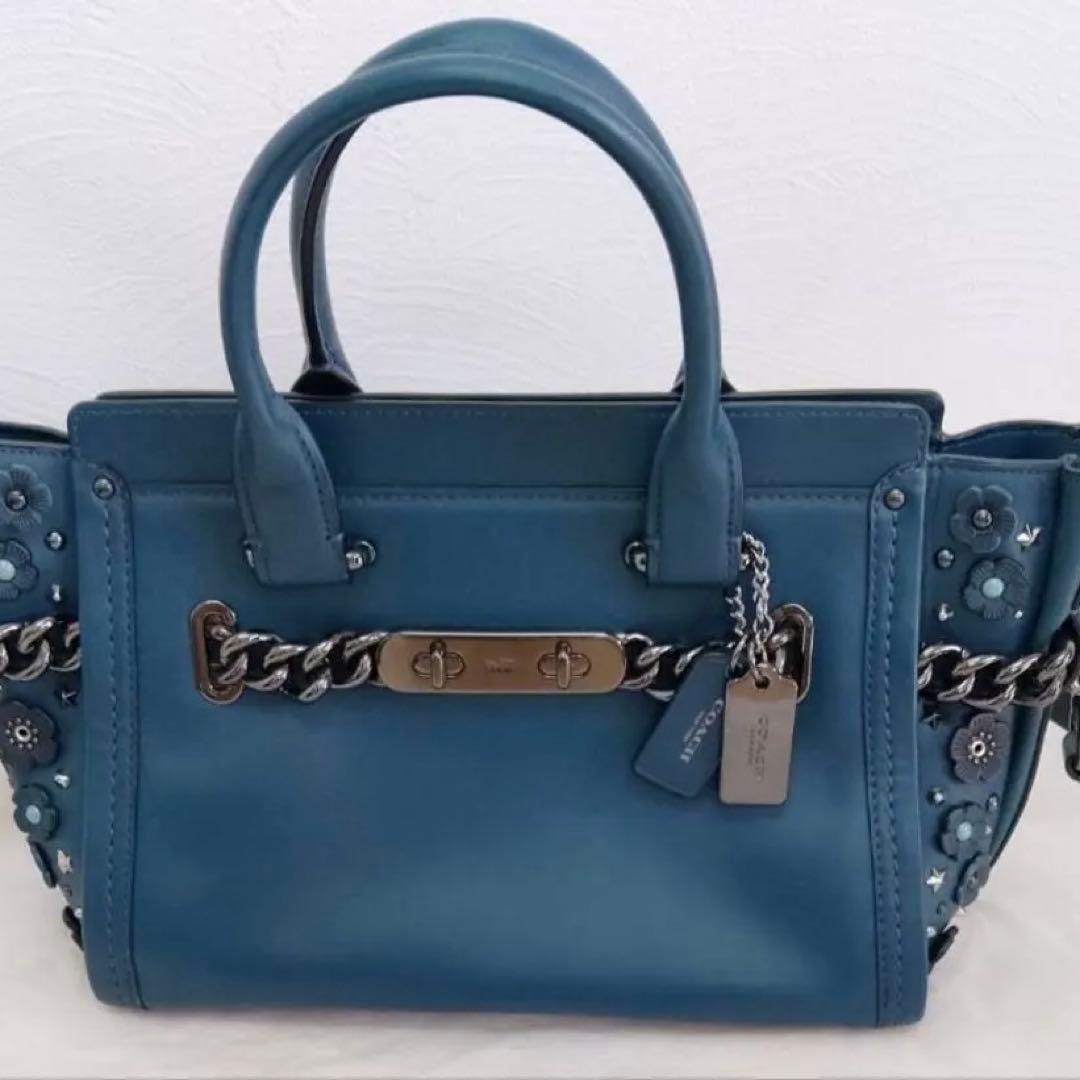 コーチのグローブレザー スワッガー 27 ハンドバッグ（ダークターコイズ）