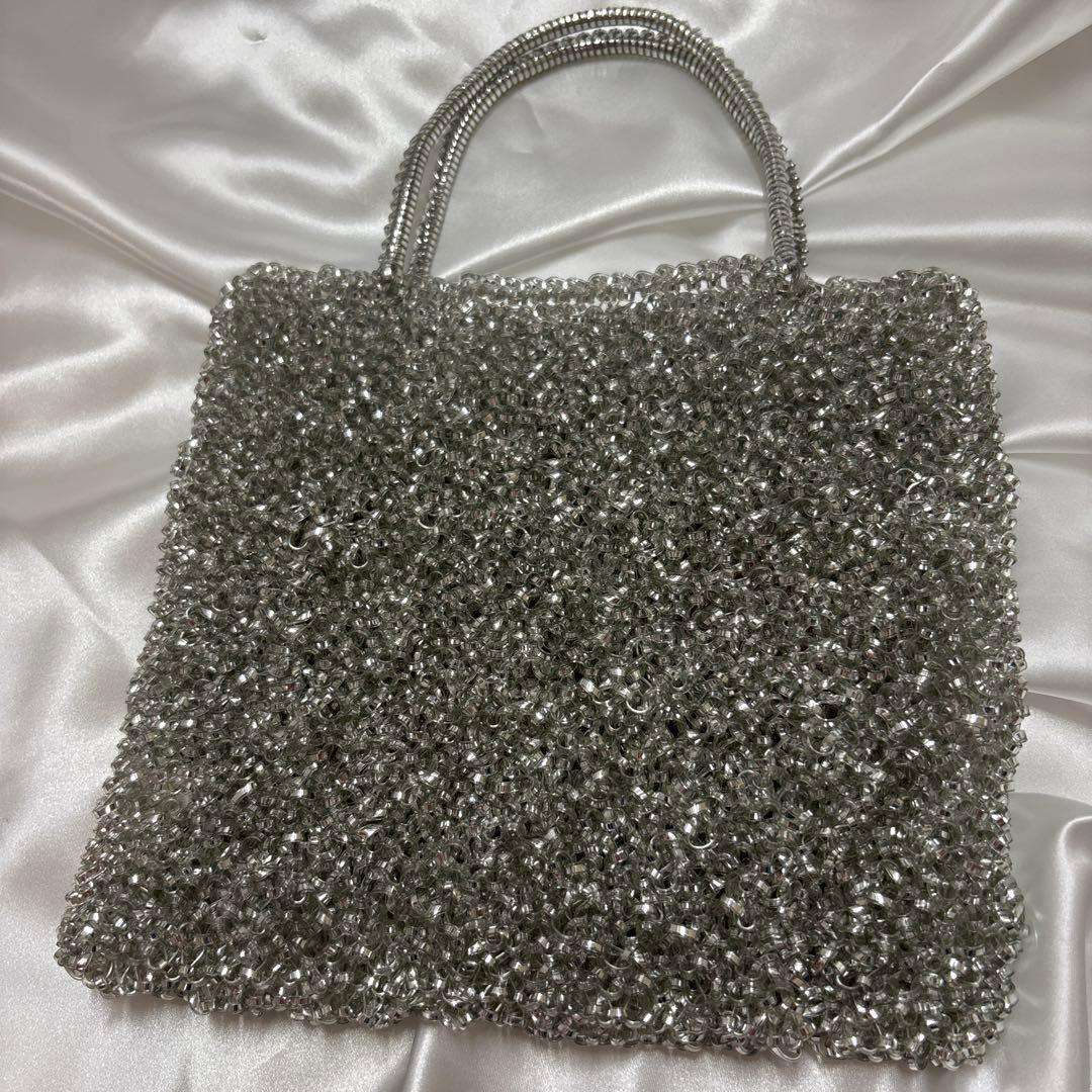 アンテプリマ ビジュー付きシルバーバッグ