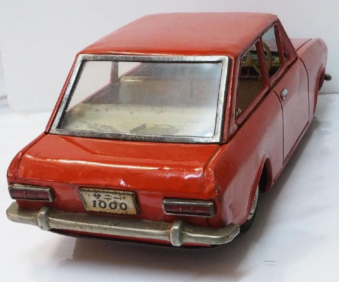 増田屋【ダットサン サニー 1000 リペイント橙】当時物ブリキ製ミニカー 箱無