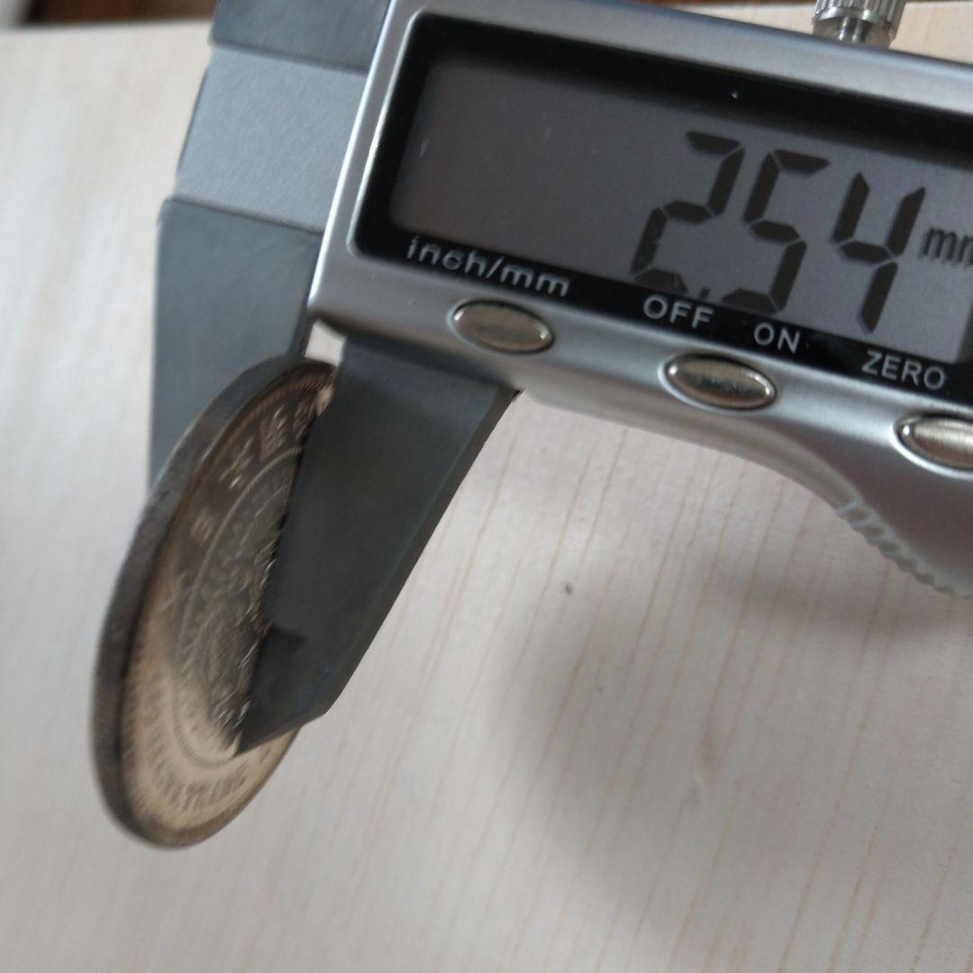 と*の様 貿易銀　明治九年　トーンあり