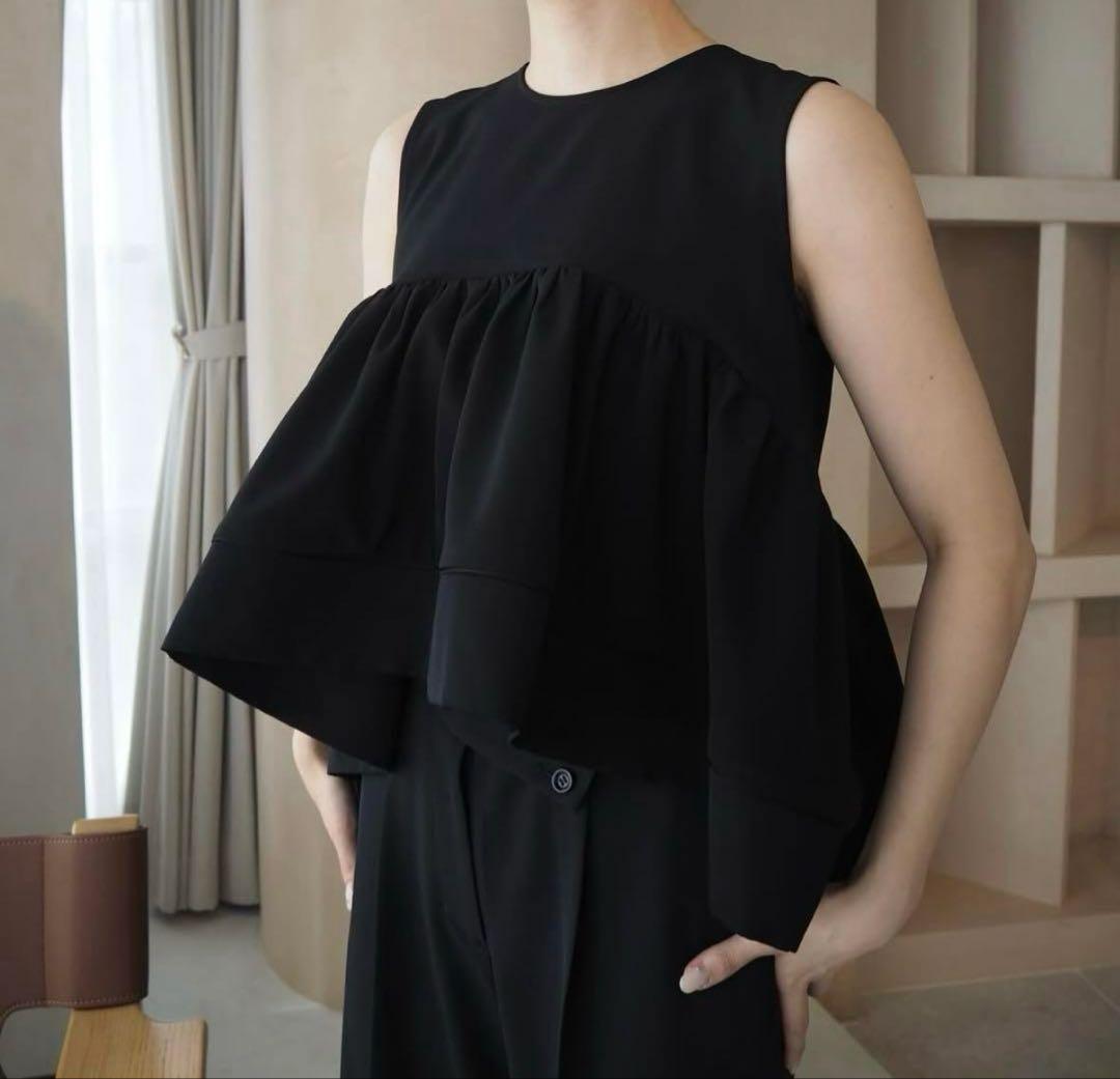 twill ラウンドペプラムボリュームブラウス