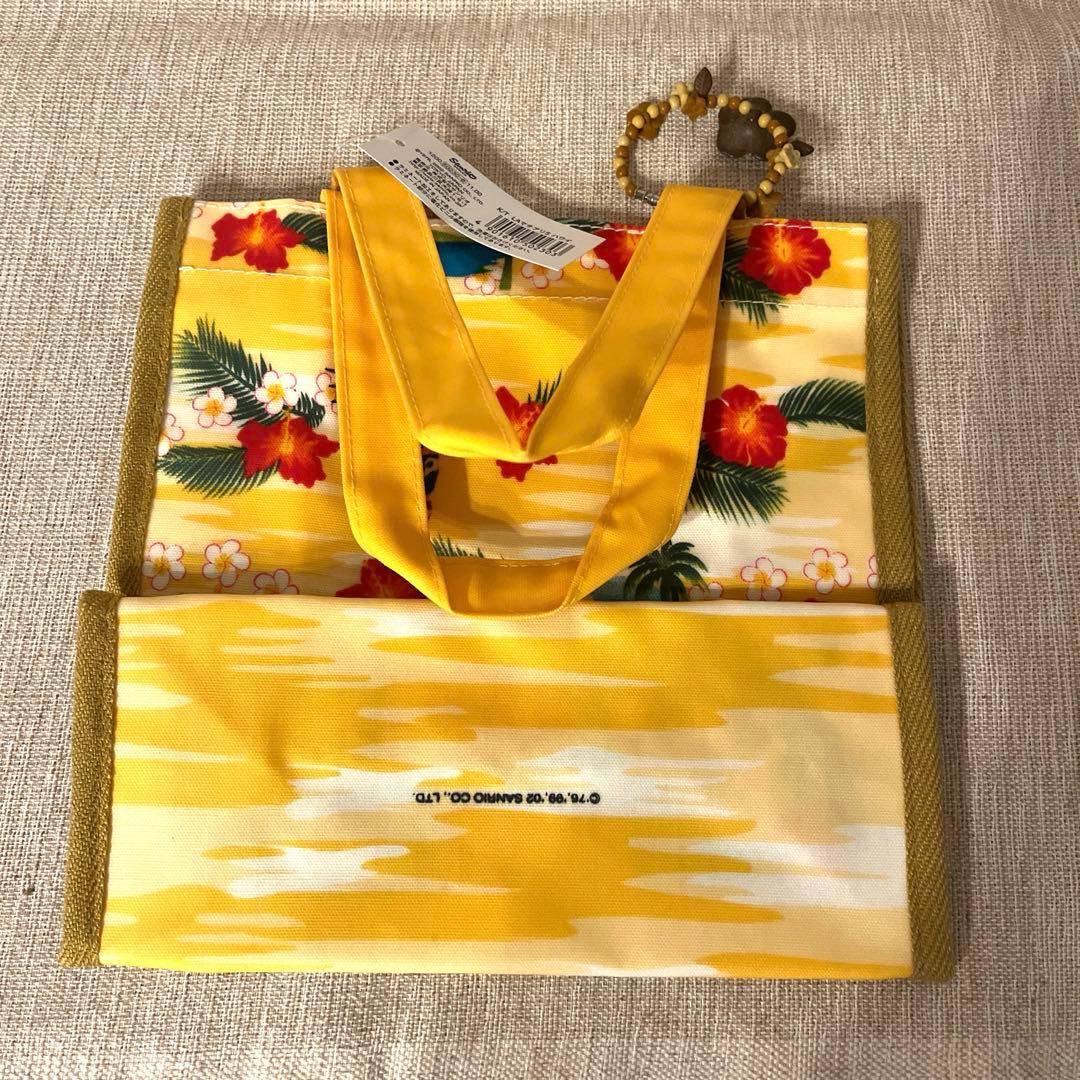 激レア‼️日焼けキティハワイアンバッグ 新品未使用品、ハイビスカスチャーム付き