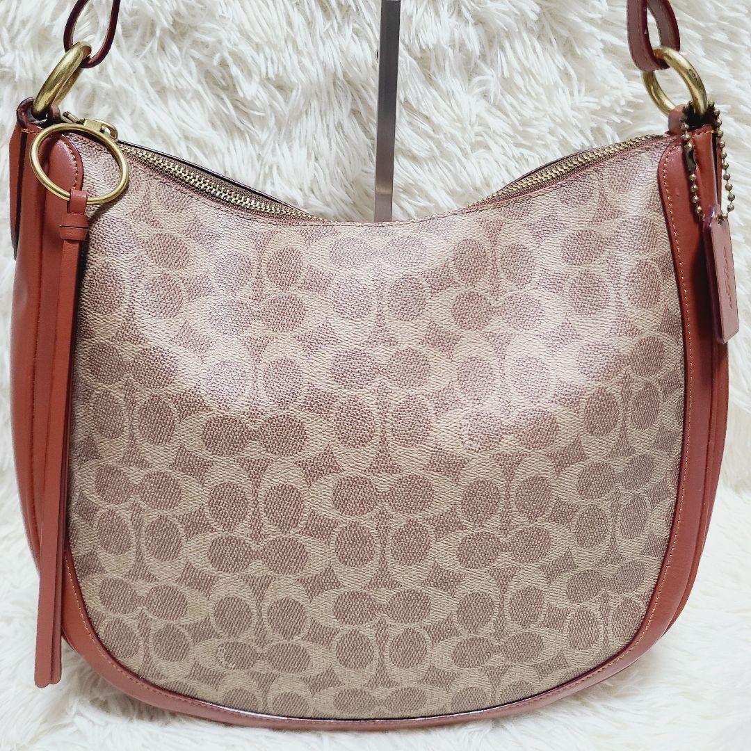 コーチ　ハンドバッグ　サットン　ホーボー　シグネチャー　PVC　レザー