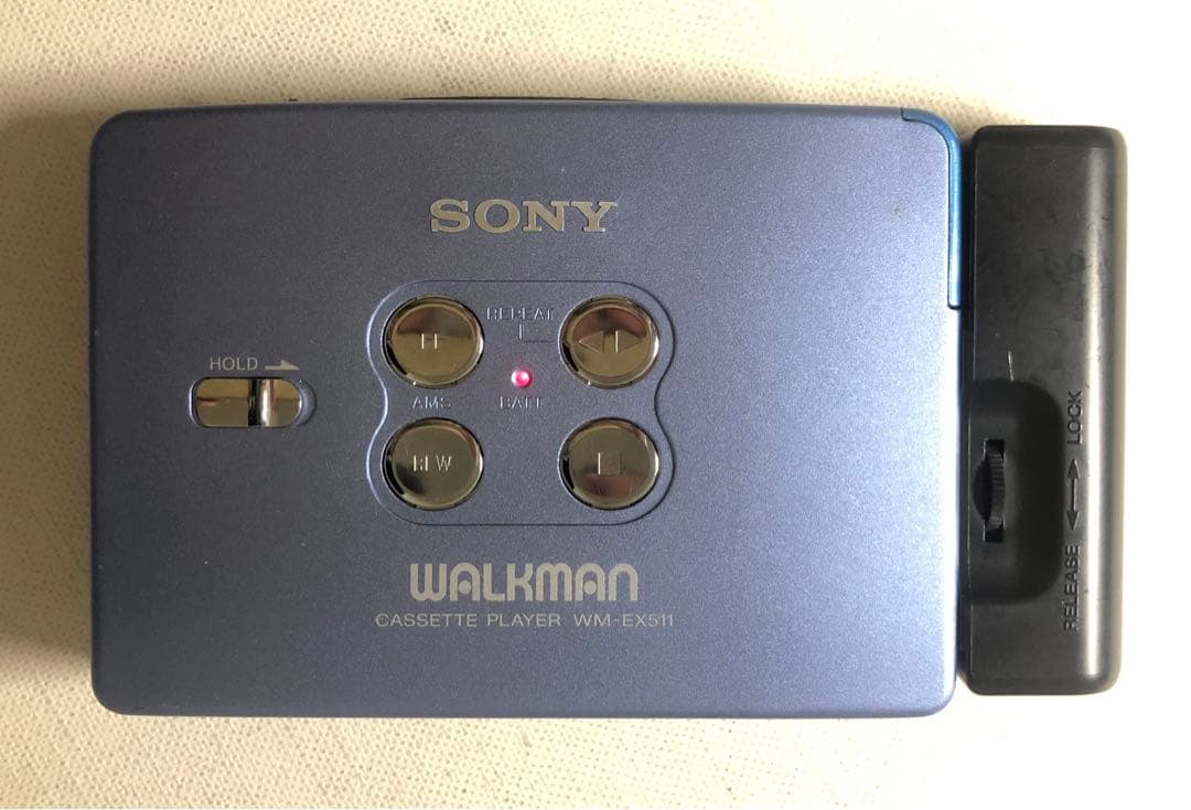 '80味聴き電ボ付WM-EX511 SONYブルーカセットウォークマン可動品E