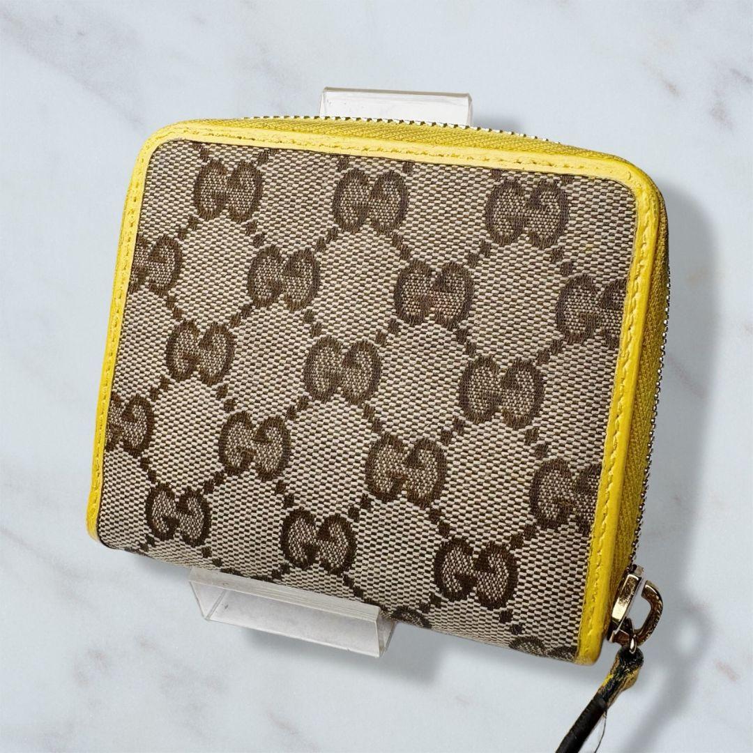 58 GUCCI 二つ折り財布 GGキャンバス h2