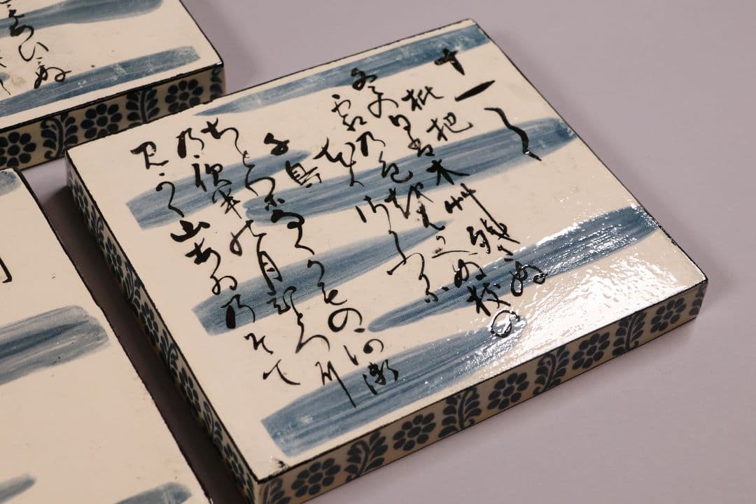 尾形乾山写 定家十二カ月花鳥和歌色絵皿 十一枚 共箱 解説書 角皿【MA498】