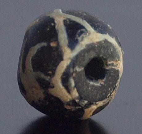 ジャワ発掘、珍しい横向き鳥マニック・ブルン　黒の胎に白で鳥・放射・Ｘ・環モチーフ