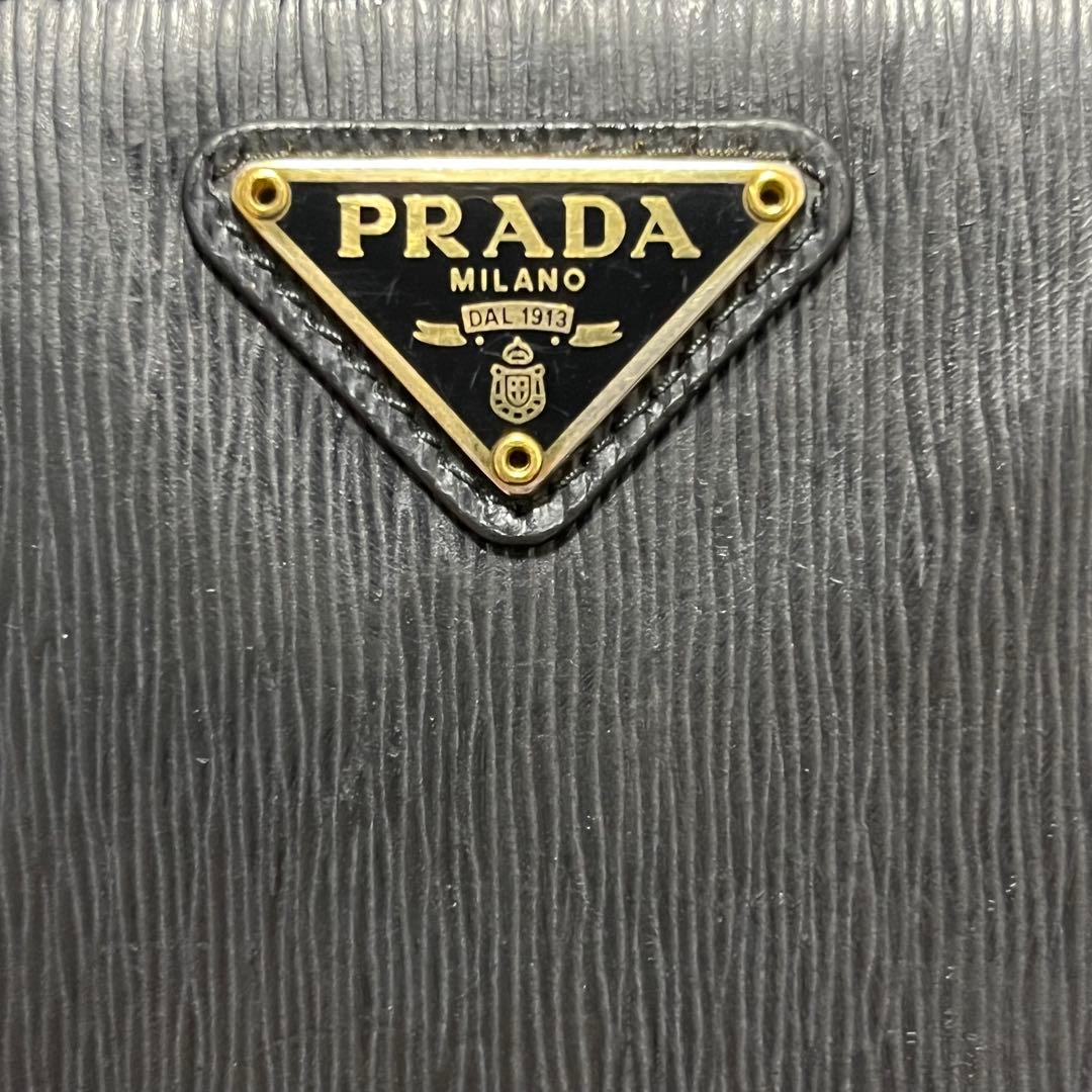 RFID搭載/美品✨プラダ　二つ折り財布 ヴィッテロムーヴ　レザー 三角 黒