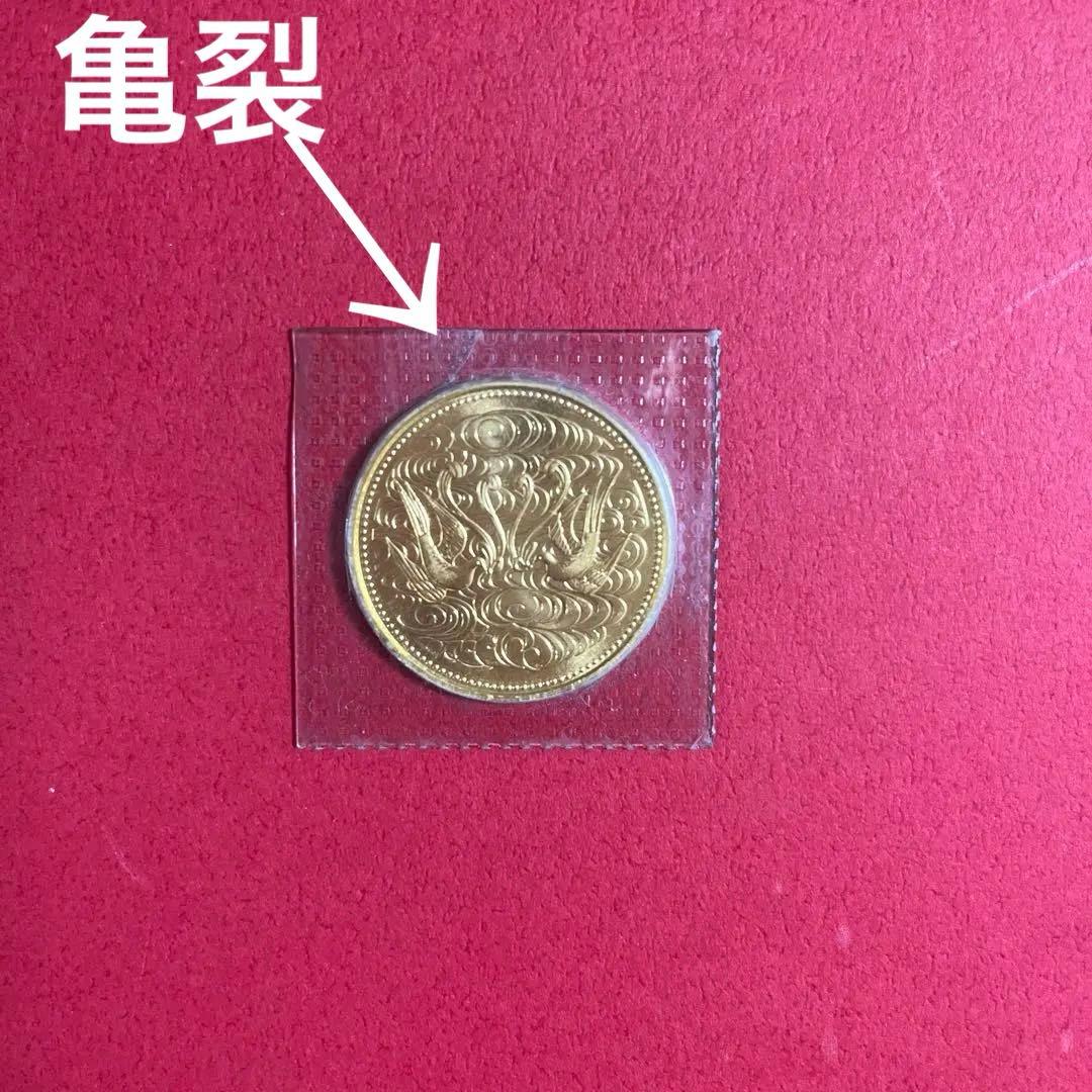 天皇陛下御在位60年記念10万円金貨
