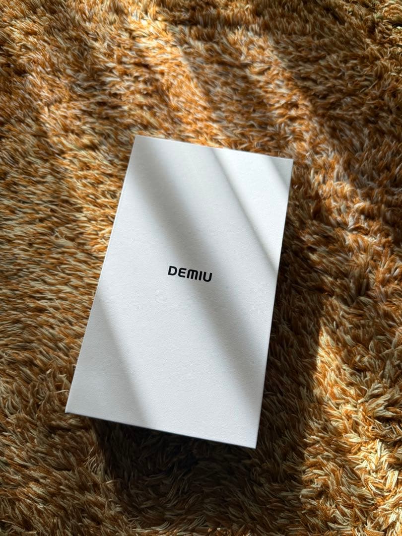 デミュウBALOON オレンジ パディング iPhone15Proケース