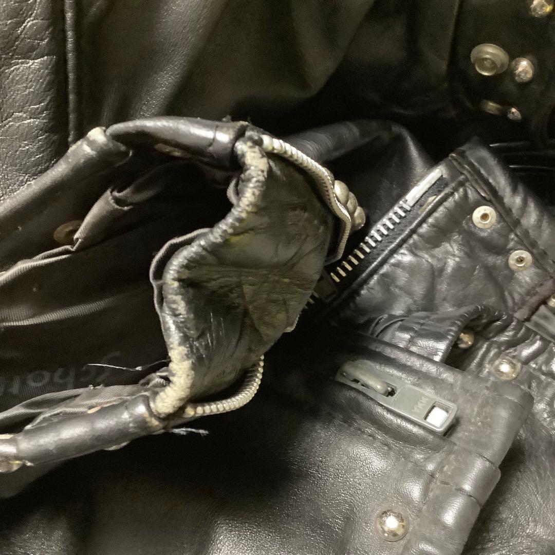 Schott スタッズ付きレザーシングルライダースジャケット K-321 メンズ