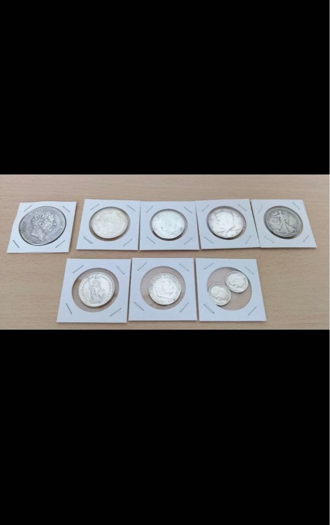 アメリカ銀貨4枚と聖ジョージと竜退治クラウン銀貨を含む銀貨9枚