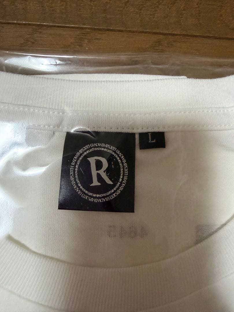 新品未開封RADWIMPS 特別展 Tシャツ 無人島に持っていき忘れた一枚