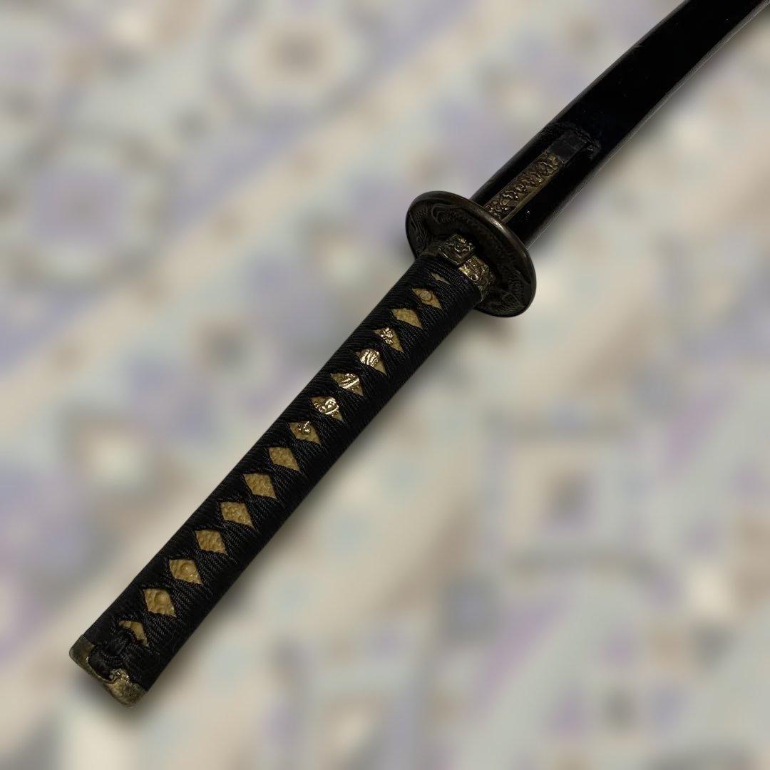 模造刀(小柄付) 黒柄 龍彫楕円鍔 黒呂鞘