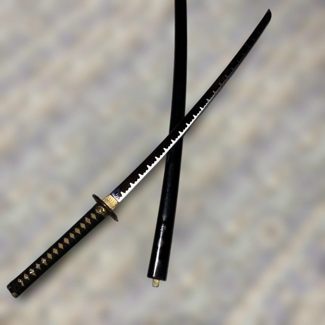 模造刀(小柄付) 黒柄 龍彫楕円鍔 黒呂鞘