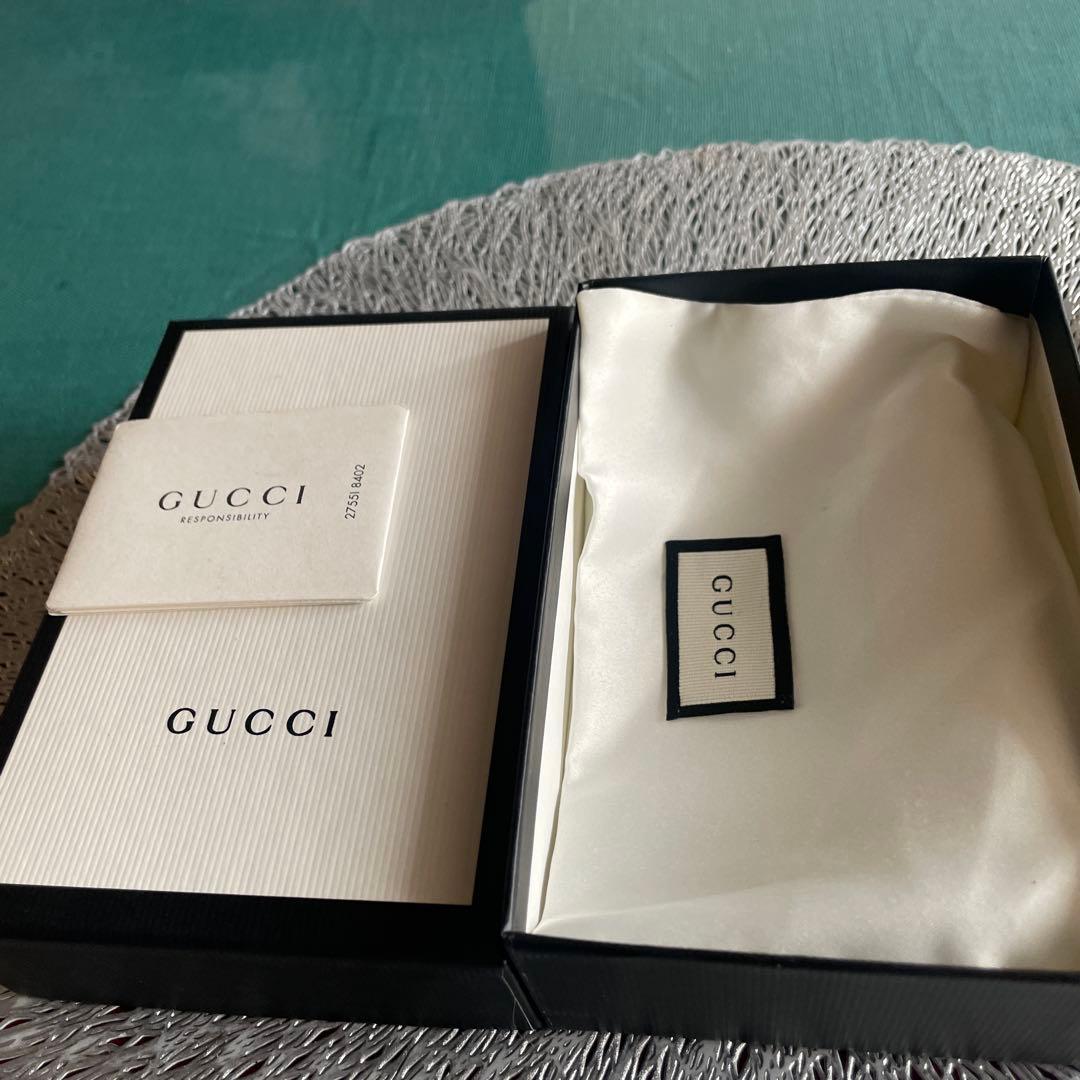 グッチ折財布　パイソンマーモントイエロー。箱付き