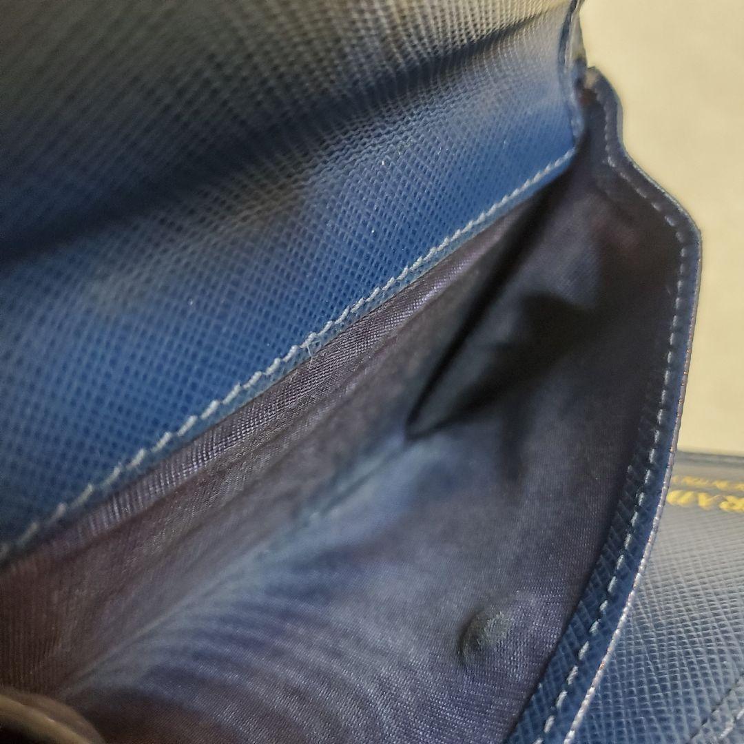 美品　PRADA 折り財布 サフィアーノ メタルロゴ リボン ブルー