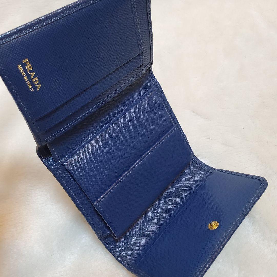 美品　PRADA 折り財布 サフィアーノ メタルロゴ リボン ブルー