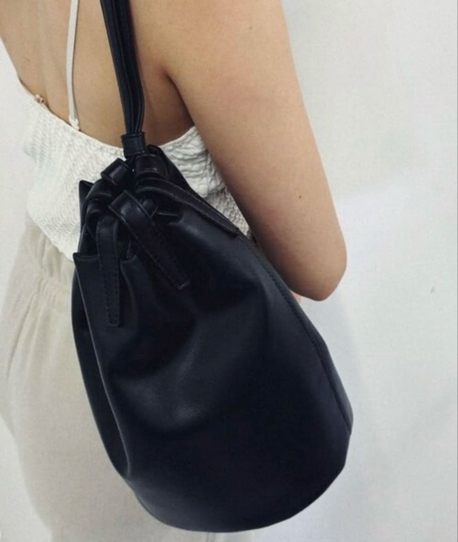 skin × lulu バッグ