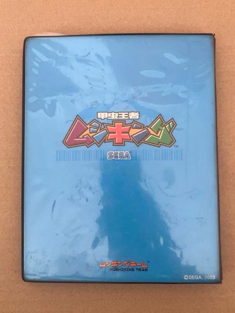 ムシキングのカード125枚とカードケース(一部セロハンで補強止有)とシールセット