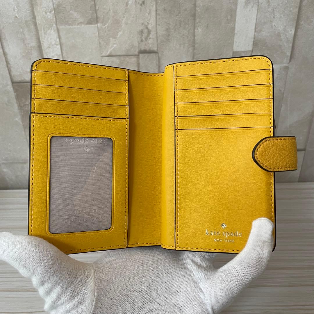 早い者勝ち！訳あり新品 kate spade 二つ折り財布 イエロー