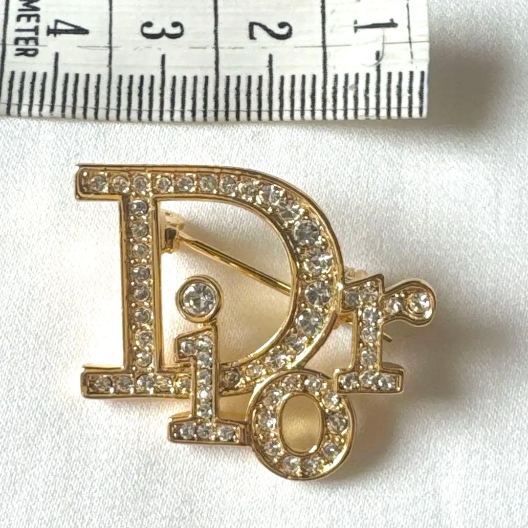 クリスチャンディオール ロゴブローチ ゴールド トロッター