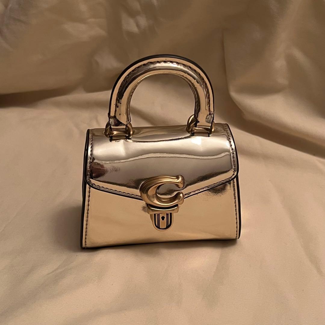 COACH ゴールド (2点)