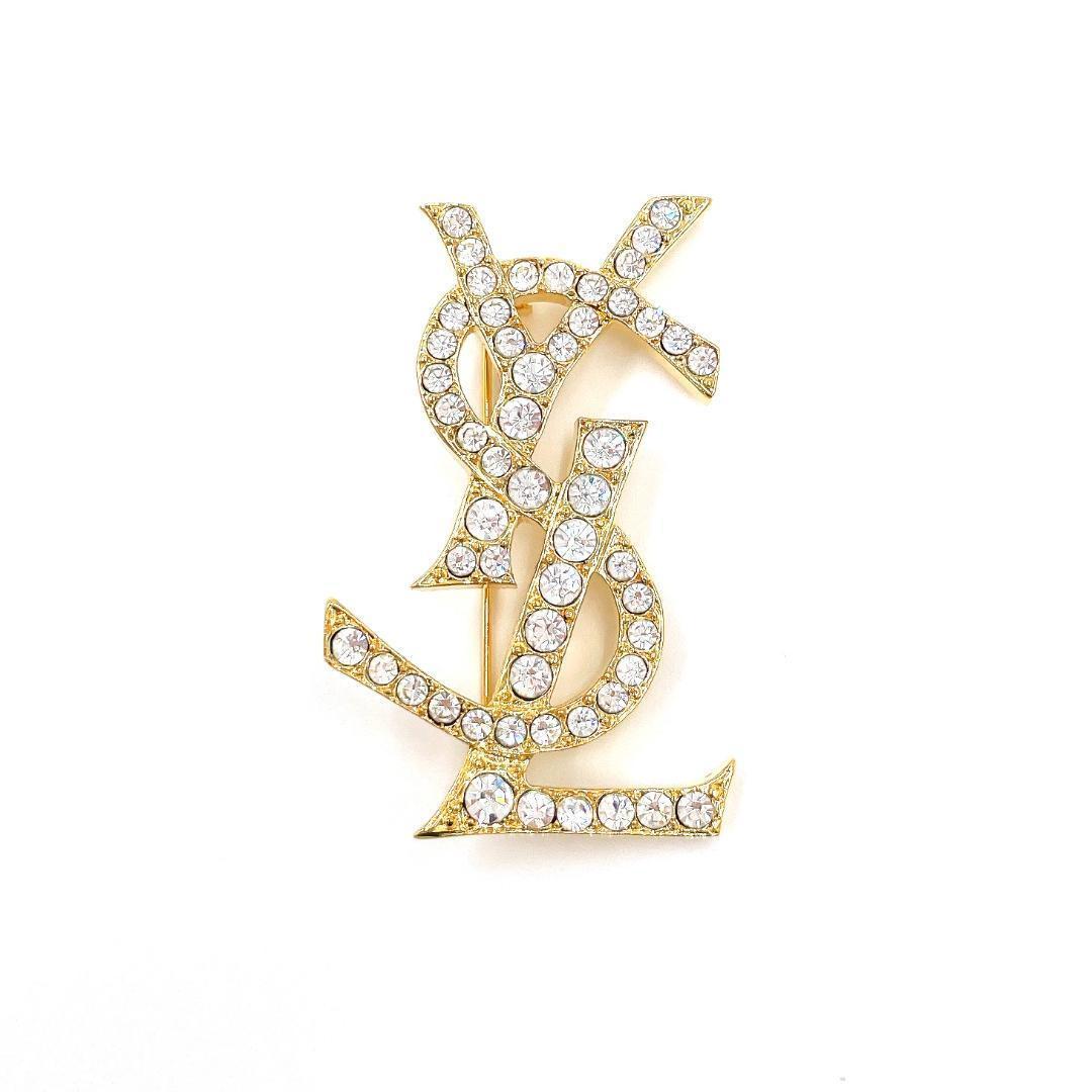 イヴサンローラン YSL ロゴ ラインストーン ブローチ レディース ゴールド