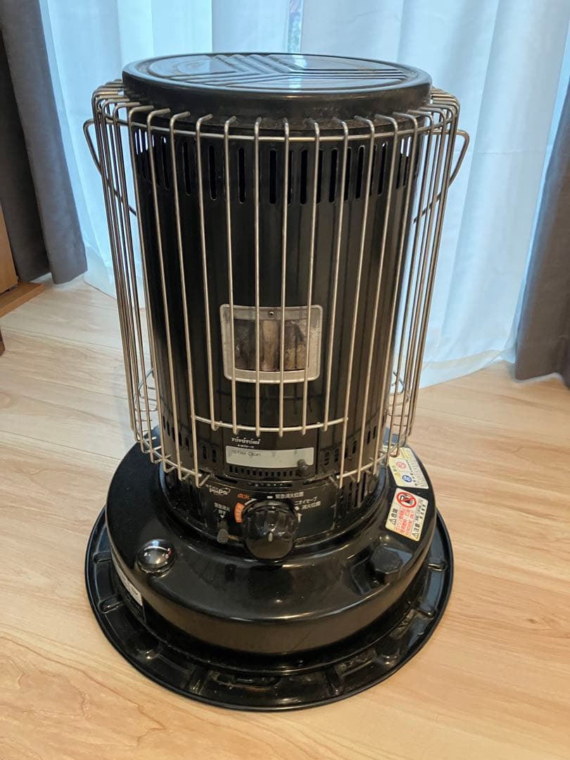 円筒形ストーブ 黒 金属ガード付き