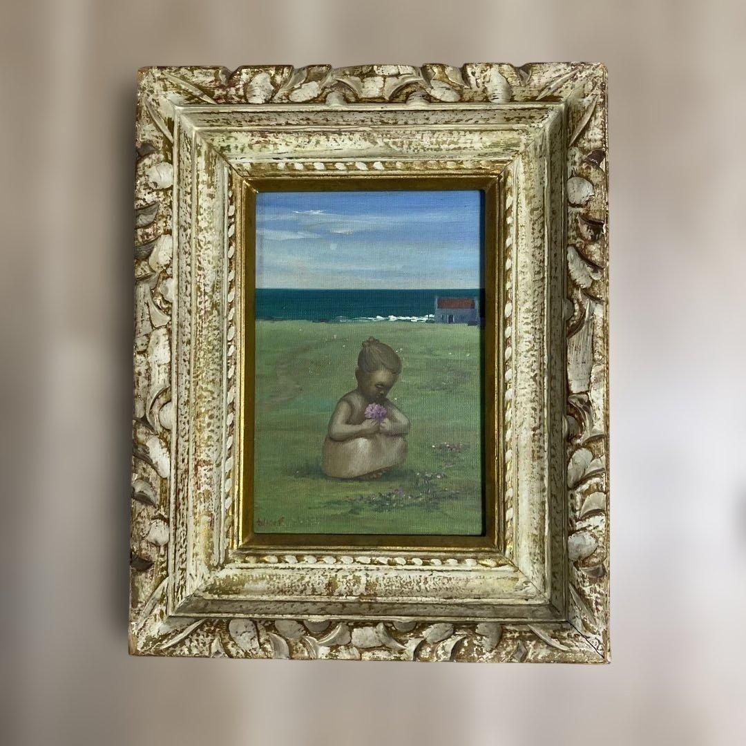 海辺の少女の油彩画