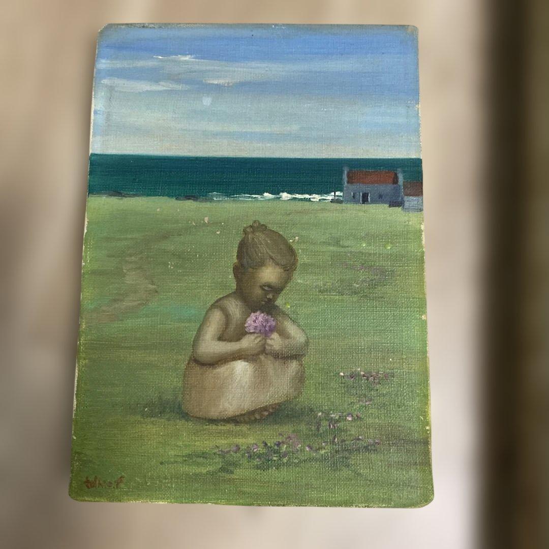 海辺の少女の油彩画