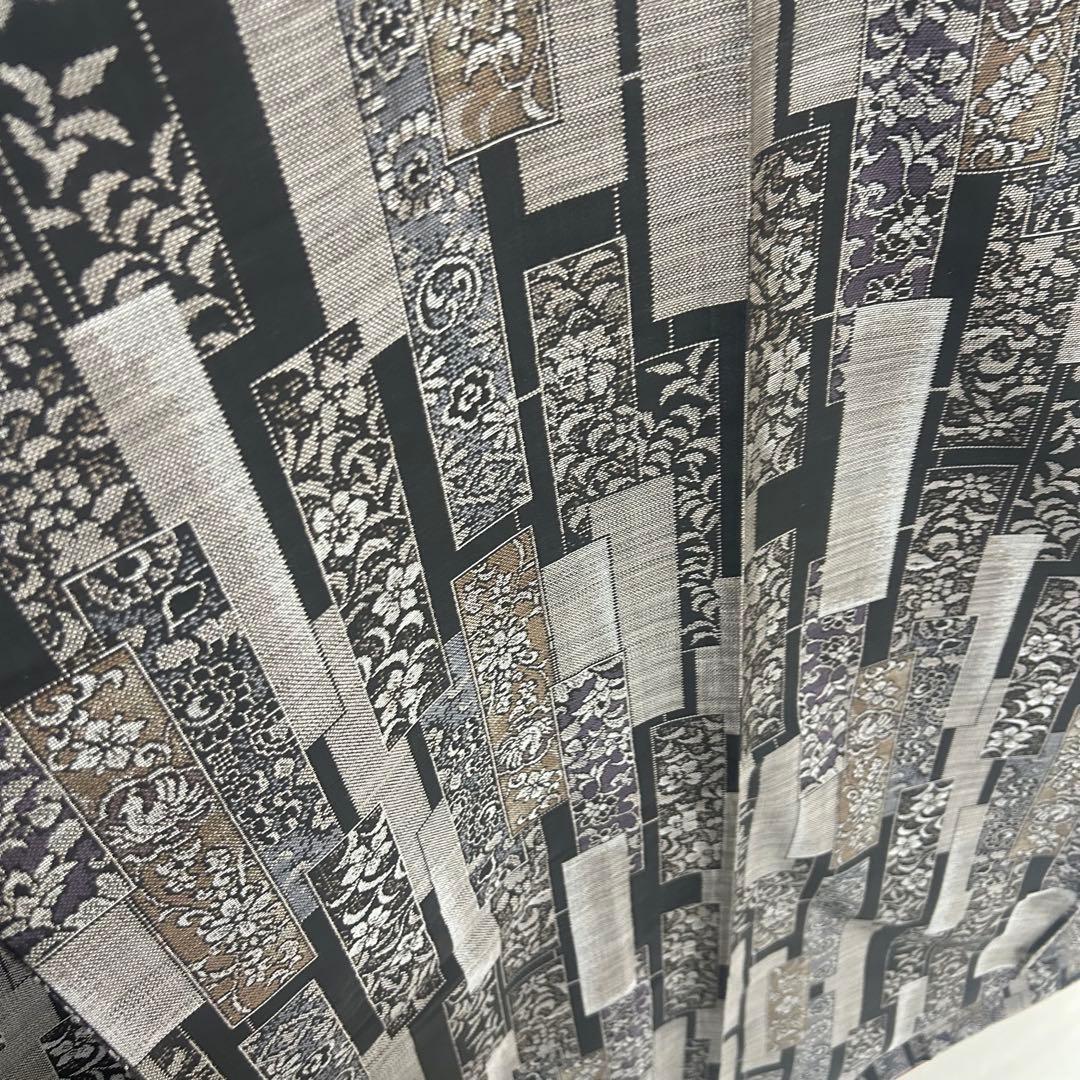 未使用品　細かな絣り！　モダン　花更紗柄　本場泥大島紬　９マルキ　着物　５１８