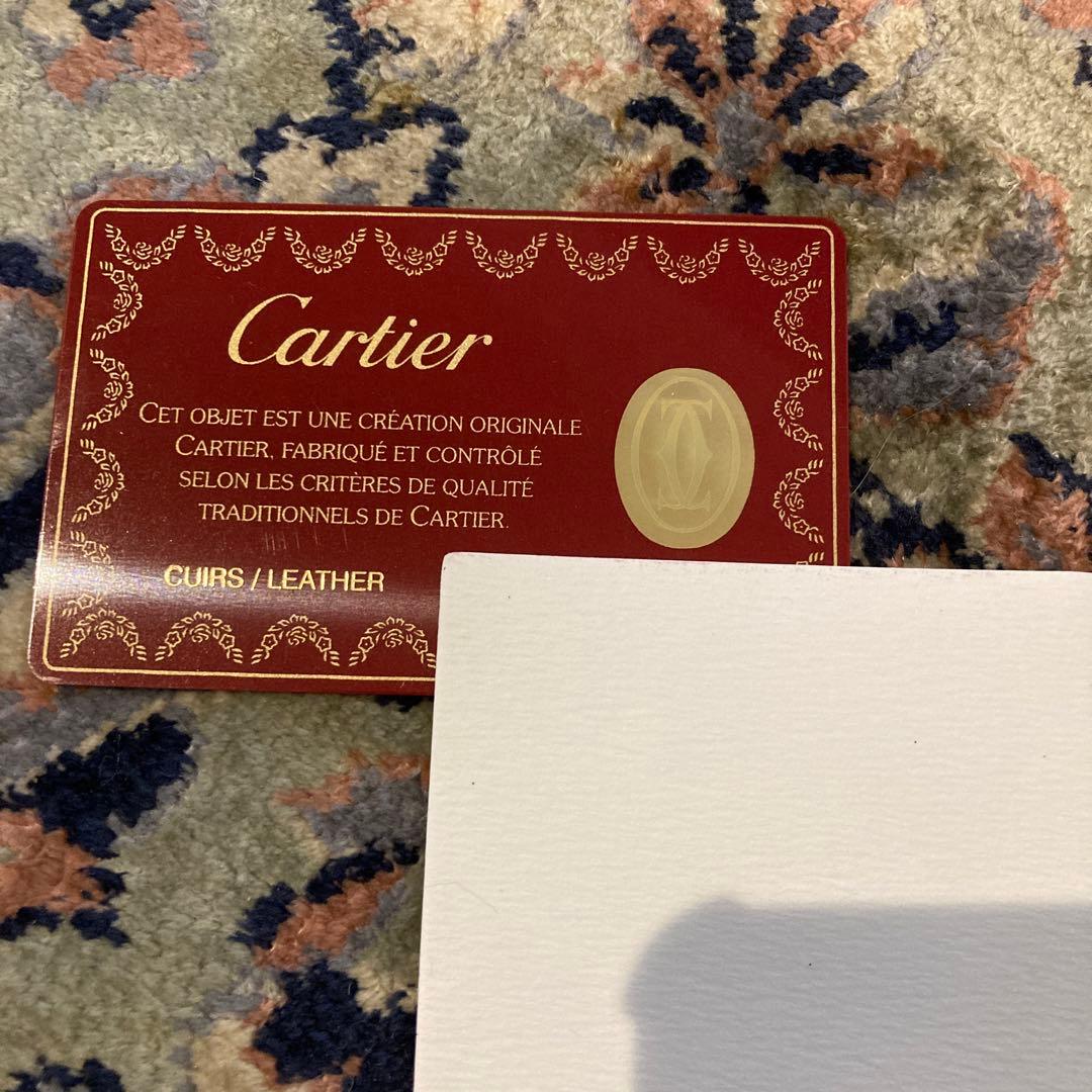 Cartier カルティエ　エンボスロゴ　二つ折り財布 ボルドー