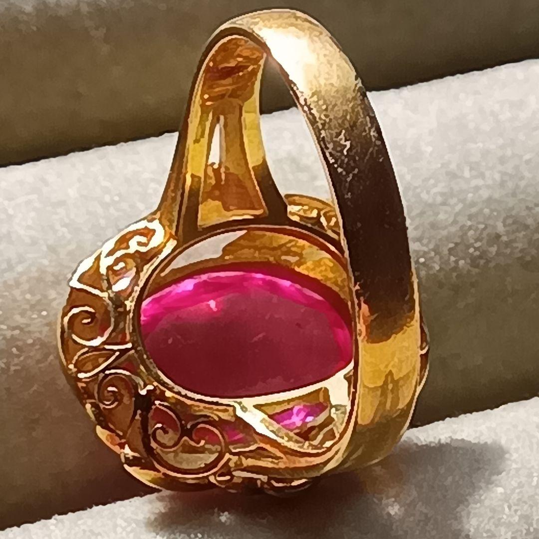 ピンク色おたからや聞くルビーかストーンリングK１８内径約１６mm重量合計４.５g