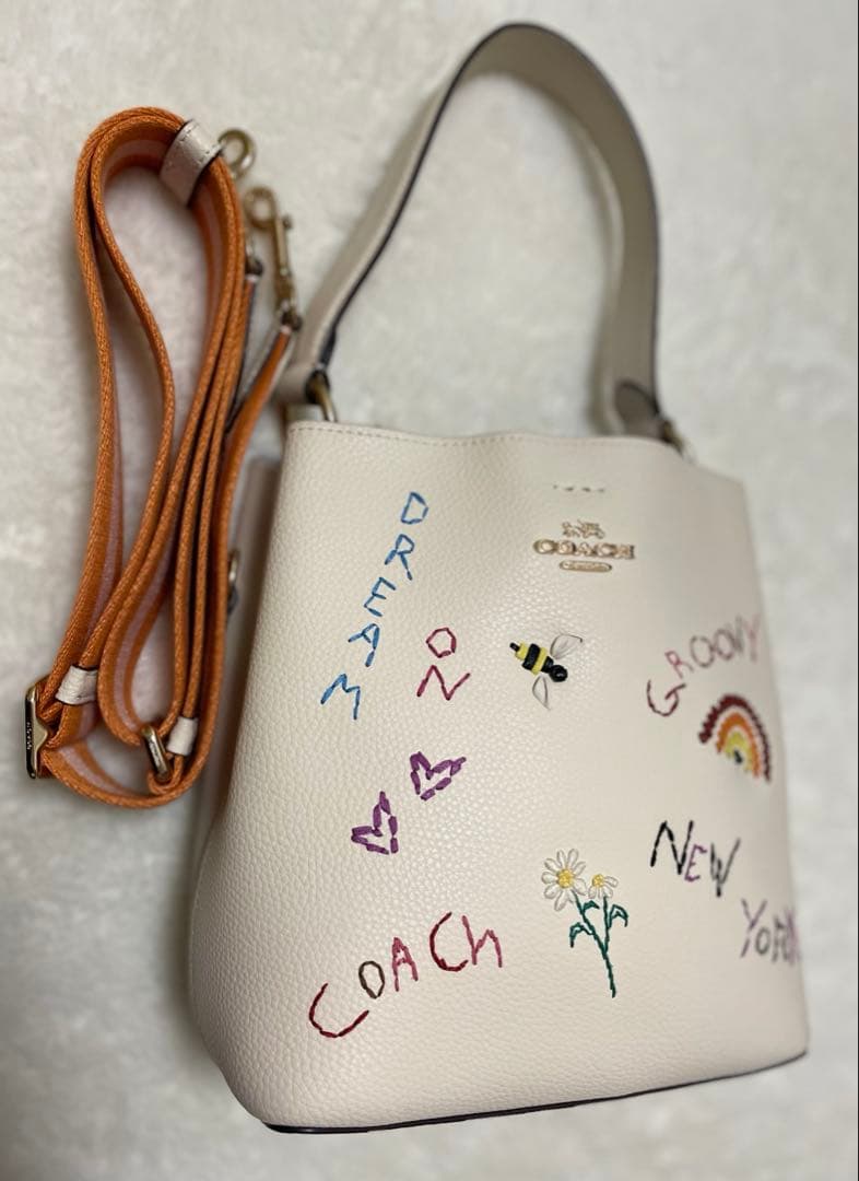み*★様 ❤️Coach SNOOPY❤️スモールタウンバケットバッグ日記刺繍付