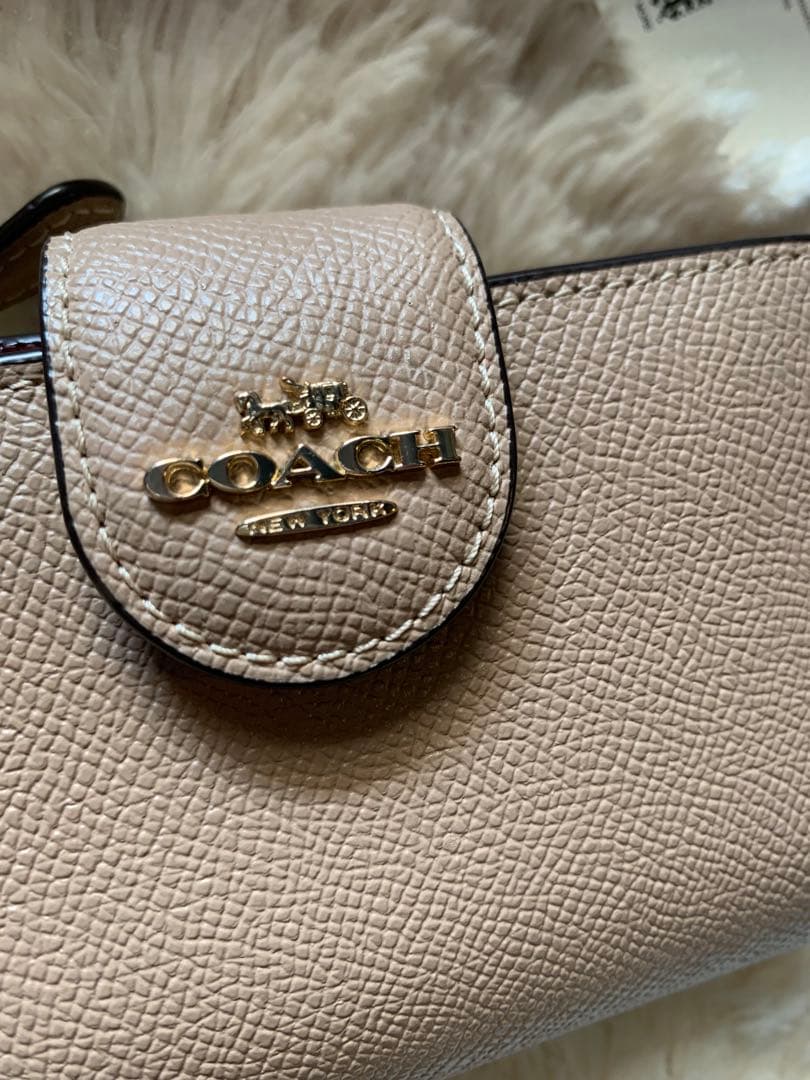 COACH ベージュ 二つ折り財布