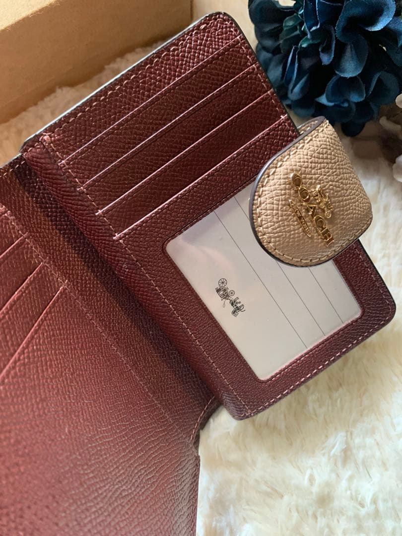 COACH ベージュ 二つ折り財布