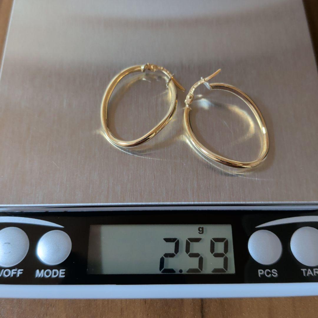 ピアス　UNOAERRE　750　YG　スナップ　ウェーブ　2.59g