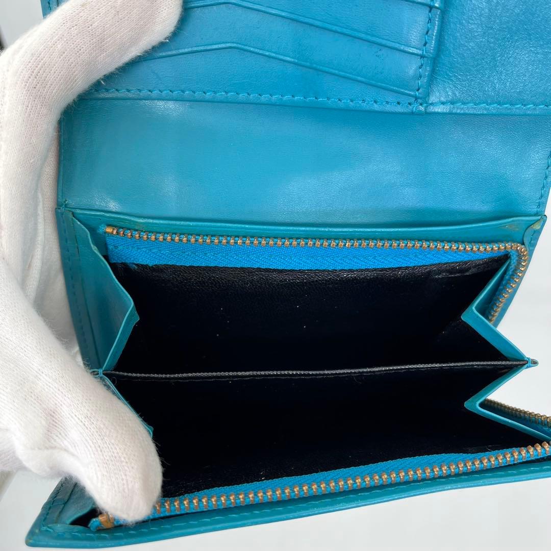 イヴサンローラン 二つ折り財布 カサンドラ YSLロゴ ライトブルー レザー