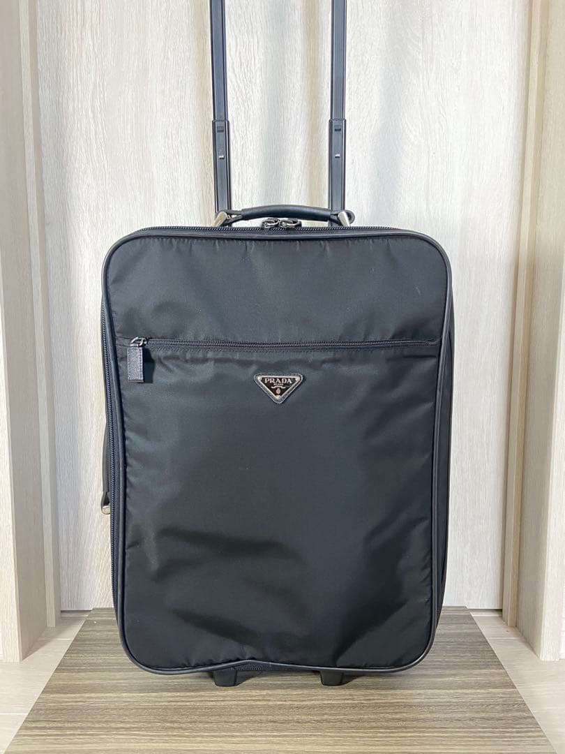 PRADA スーツケース　ナイロン　三角ロゴプレート　キャリーケース　黒　レザー