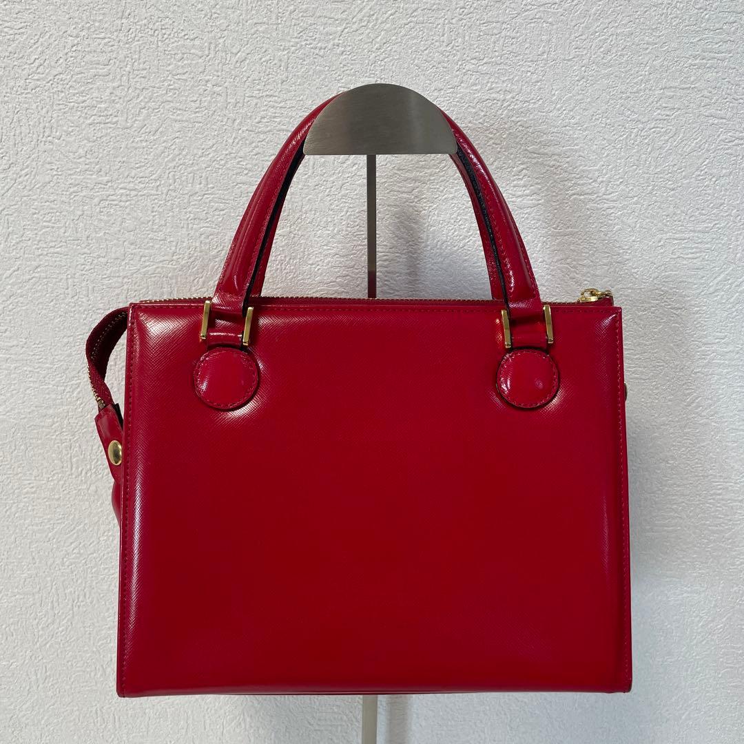 ジャンニヴェルサーチ ハンドバッグ 赤 レザー チャーム付